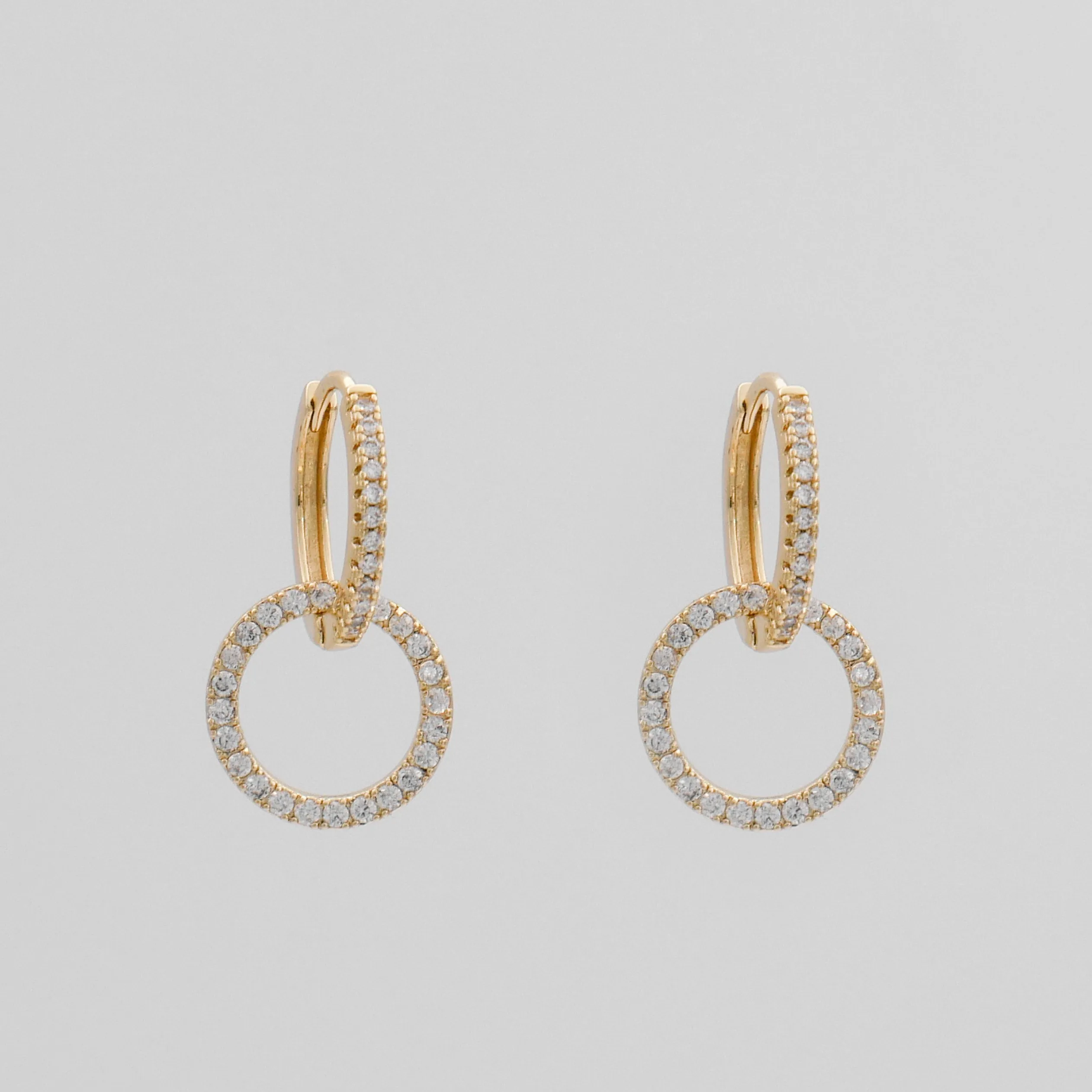 Isla Interlocking Huggie Earrings sold by PRYA