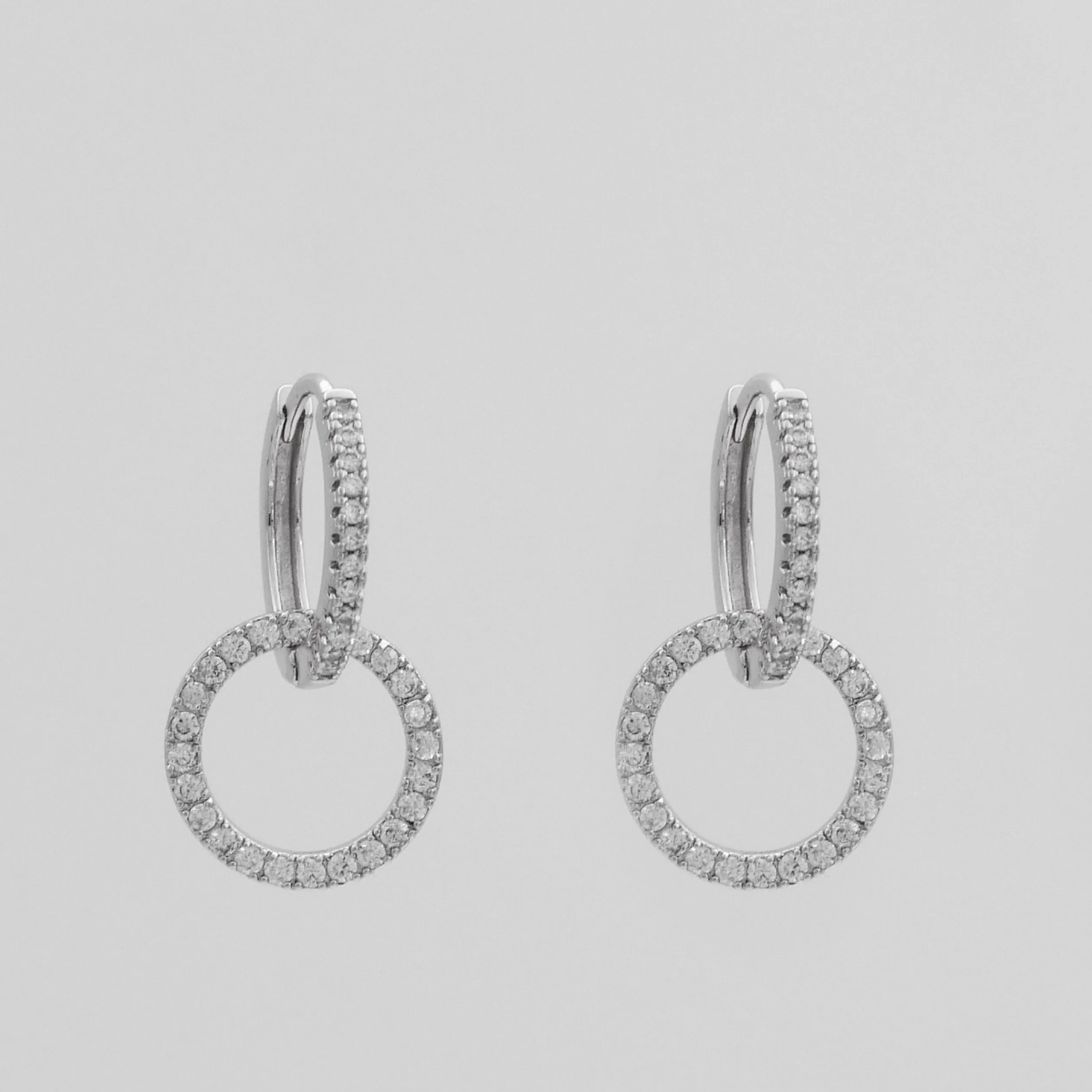 Isla Interlocking Huggie Earrings sold by PRYA product image thumbnail 5