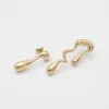 Soraya Asymmetric Drop Earrings sold by PRYA