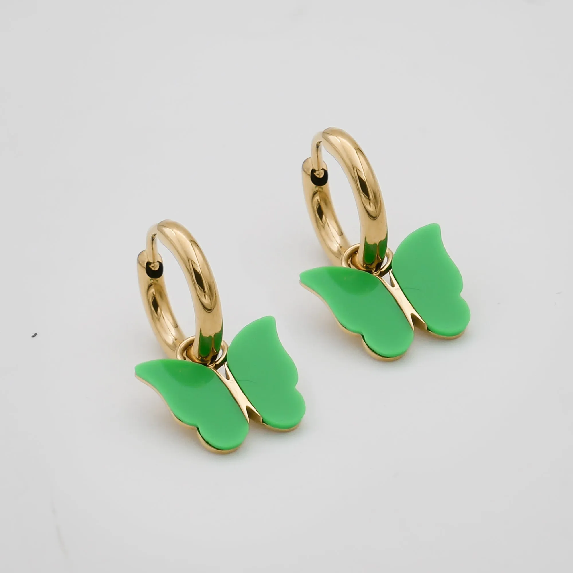Butterfly Huggie Earrings sold by PRYA product image thumbnail 5