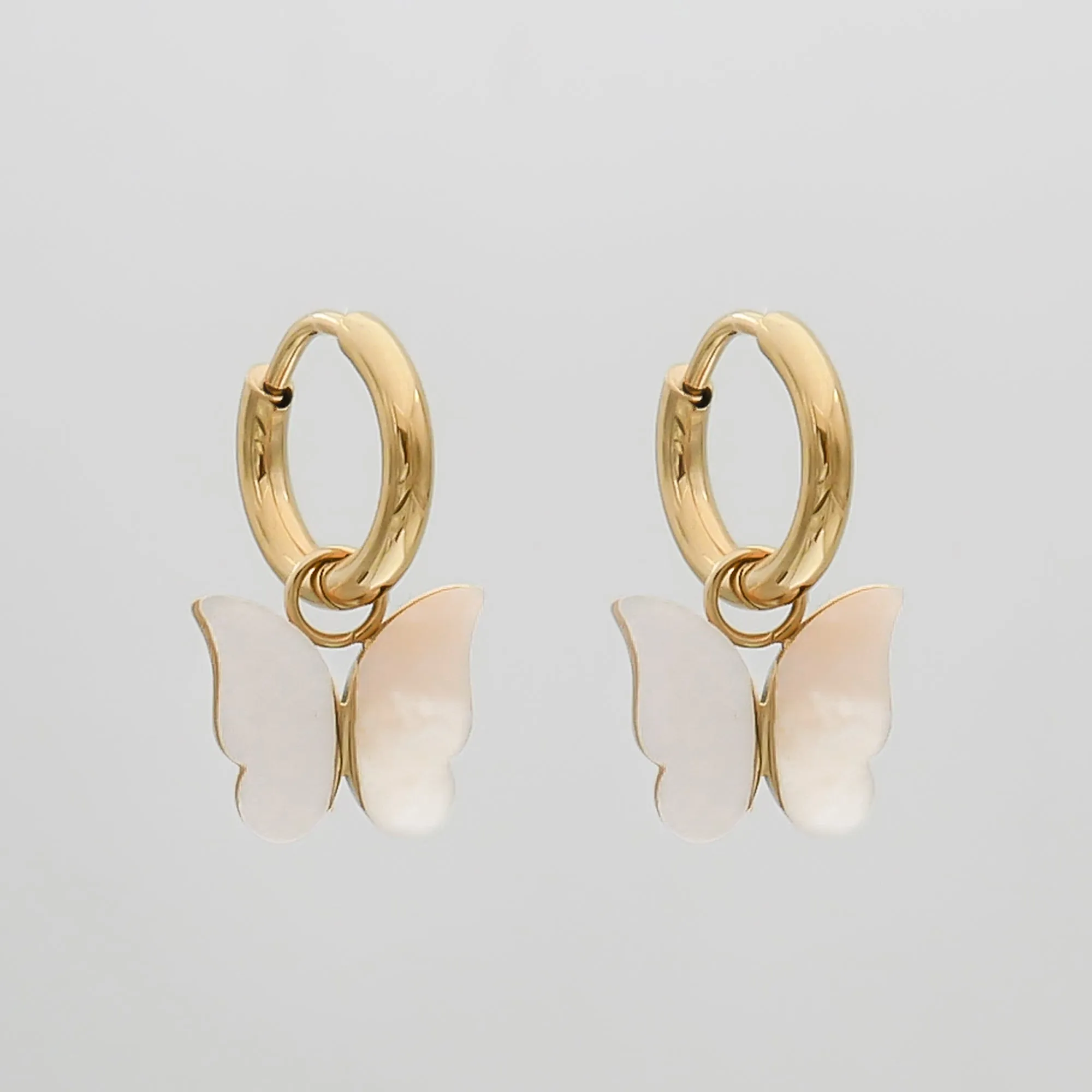 Butterfly Huggie Earrings sold by PRYA