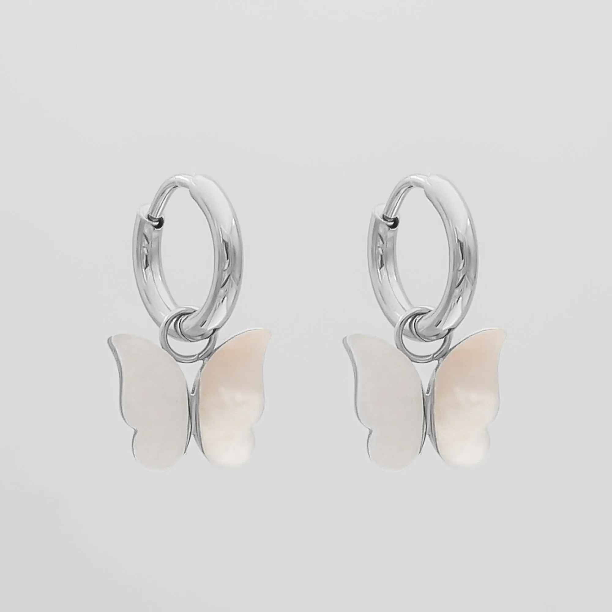 Butterfly Huggie Earrings sold by PRYA product image thumbnail 4