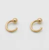 Lara Half Hoop Earrings sold by PRYA