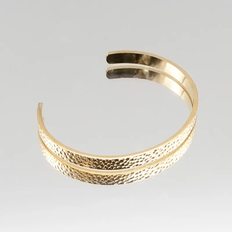 Amara Hammered Bangle sold by PRYA