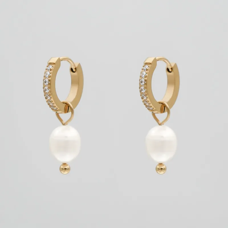Esme Pearl Huggie Earrings sold by PRYA