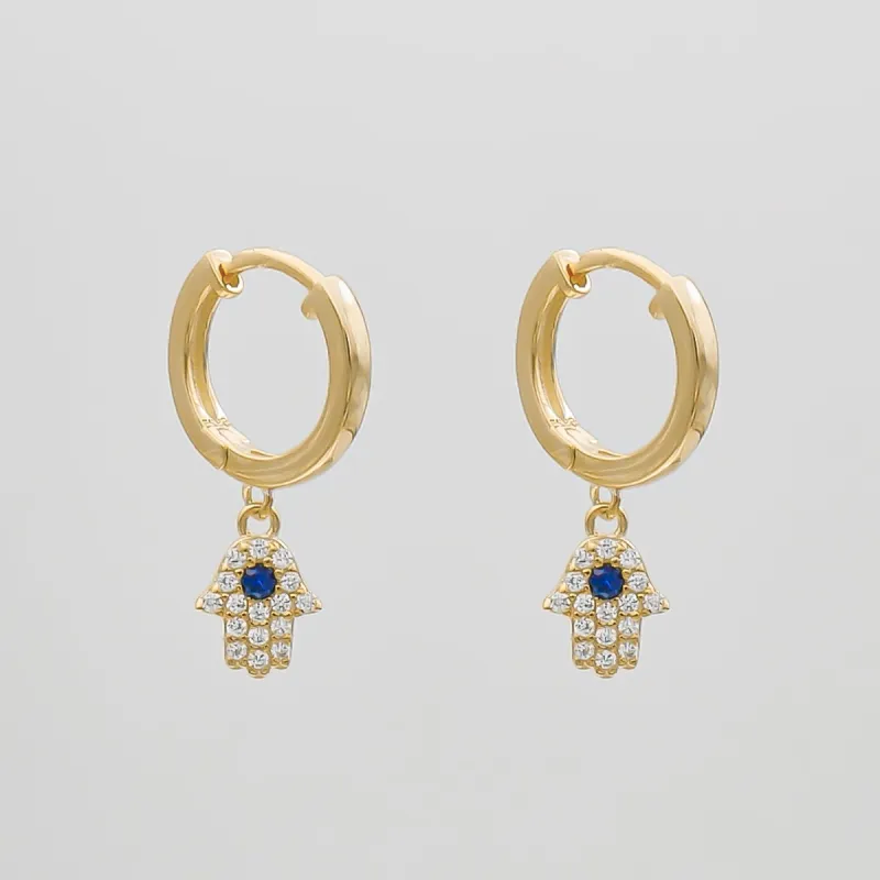 Hand of Hamsa Huggie Earrings sold by PRYA