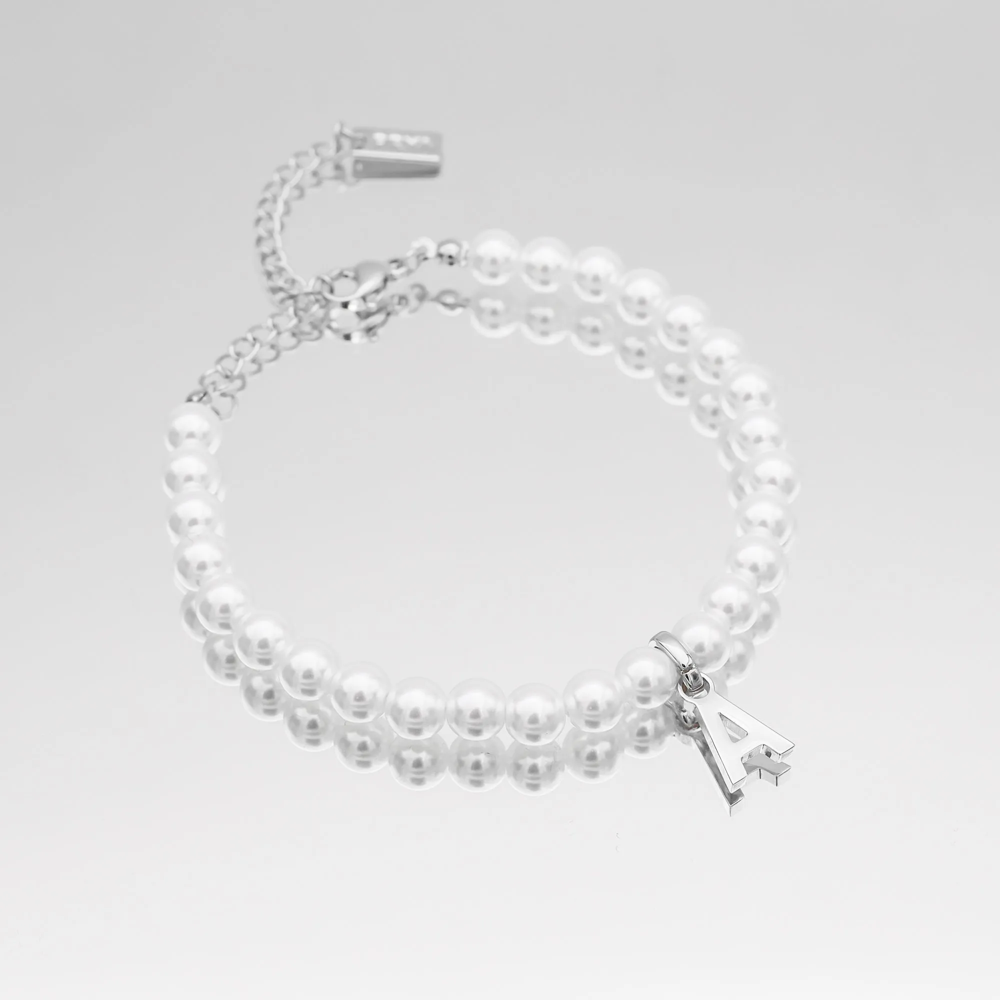 Classic Pearl Initial Bracelet sold by PRYA