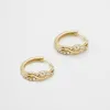 Riva Huggie Earrings sold by PRYA