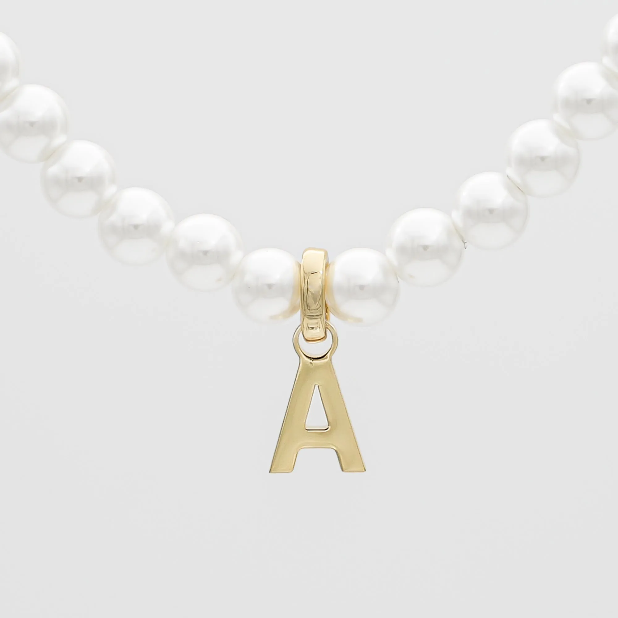 Classic Pearl Initial Necklace sold by PRYA