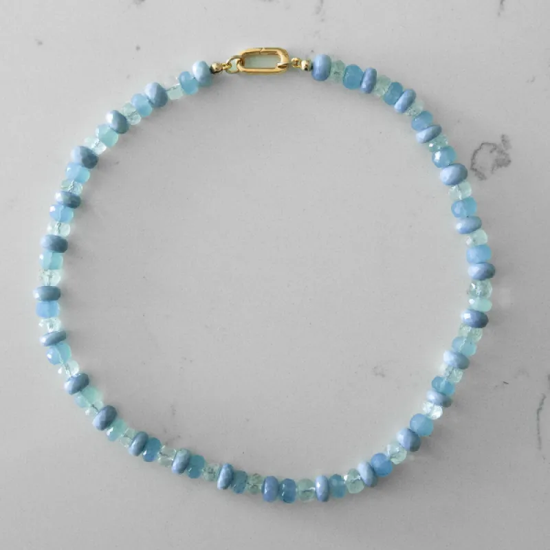 Alternating Blue Opal, Light Aquamarine, and Blue Chalcedony Gemstone Necklace sold by HART