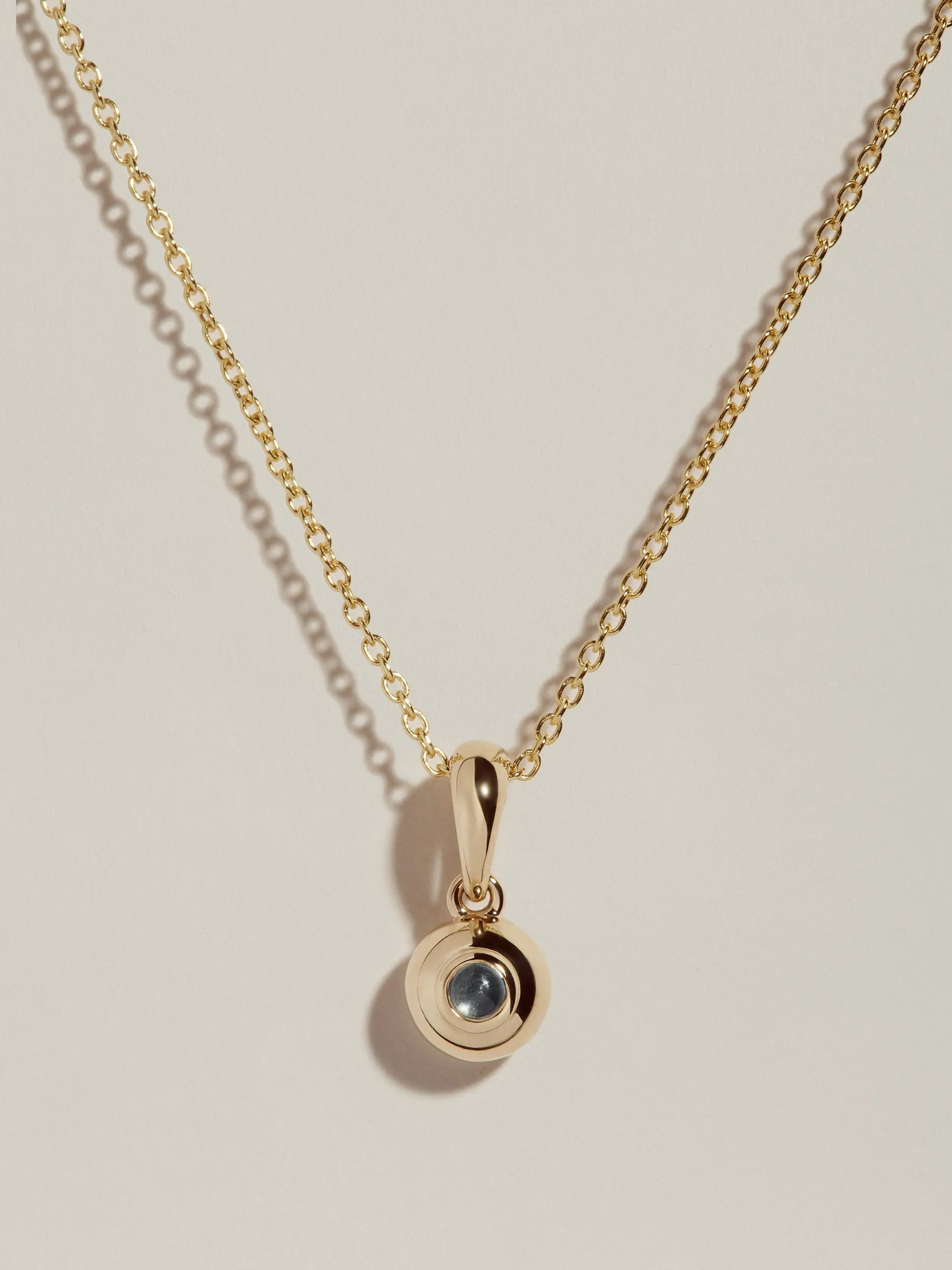Sapphire Form Pendant sold by J. Hannah Jewelry