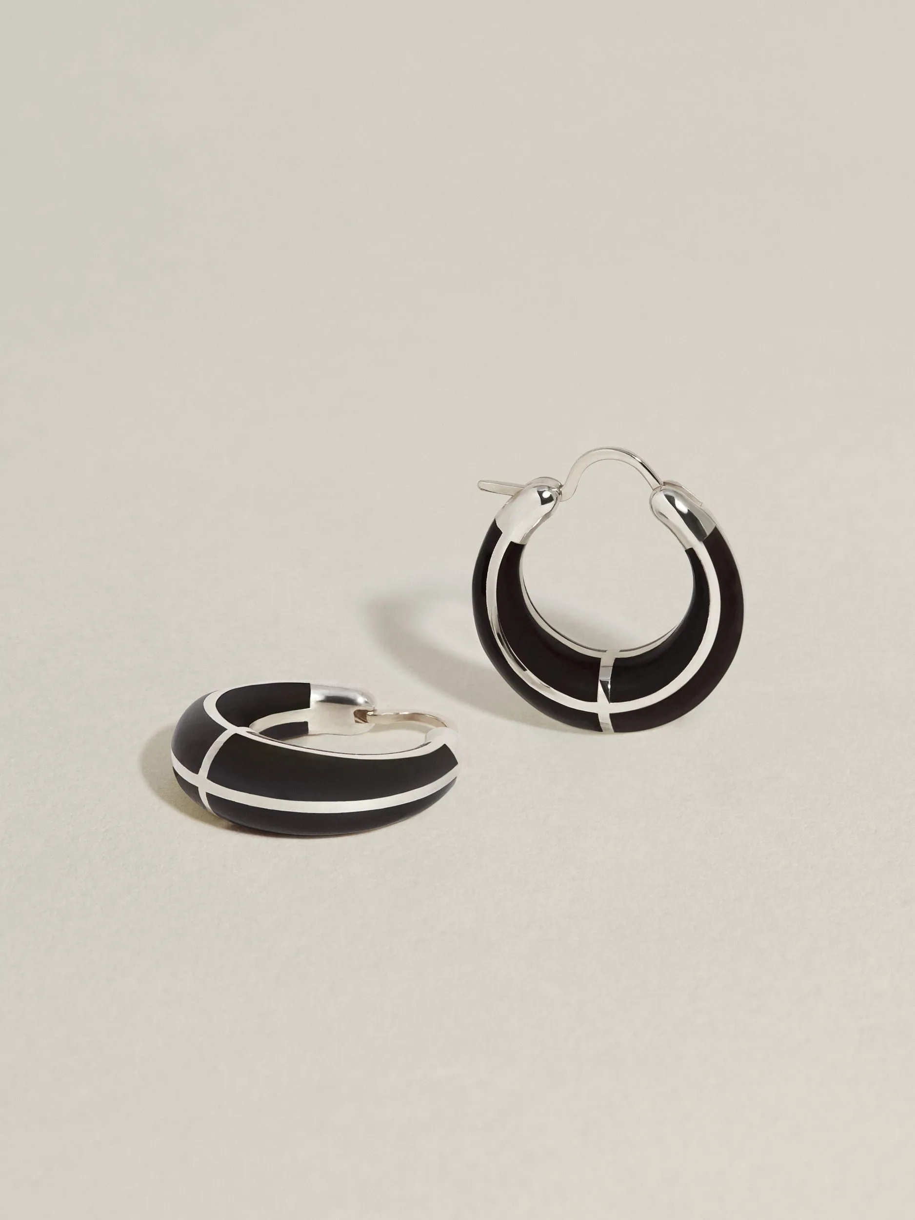 Arc Inlay Hoops (Onyx Monochrome) sold by J. Hannah Jewelry