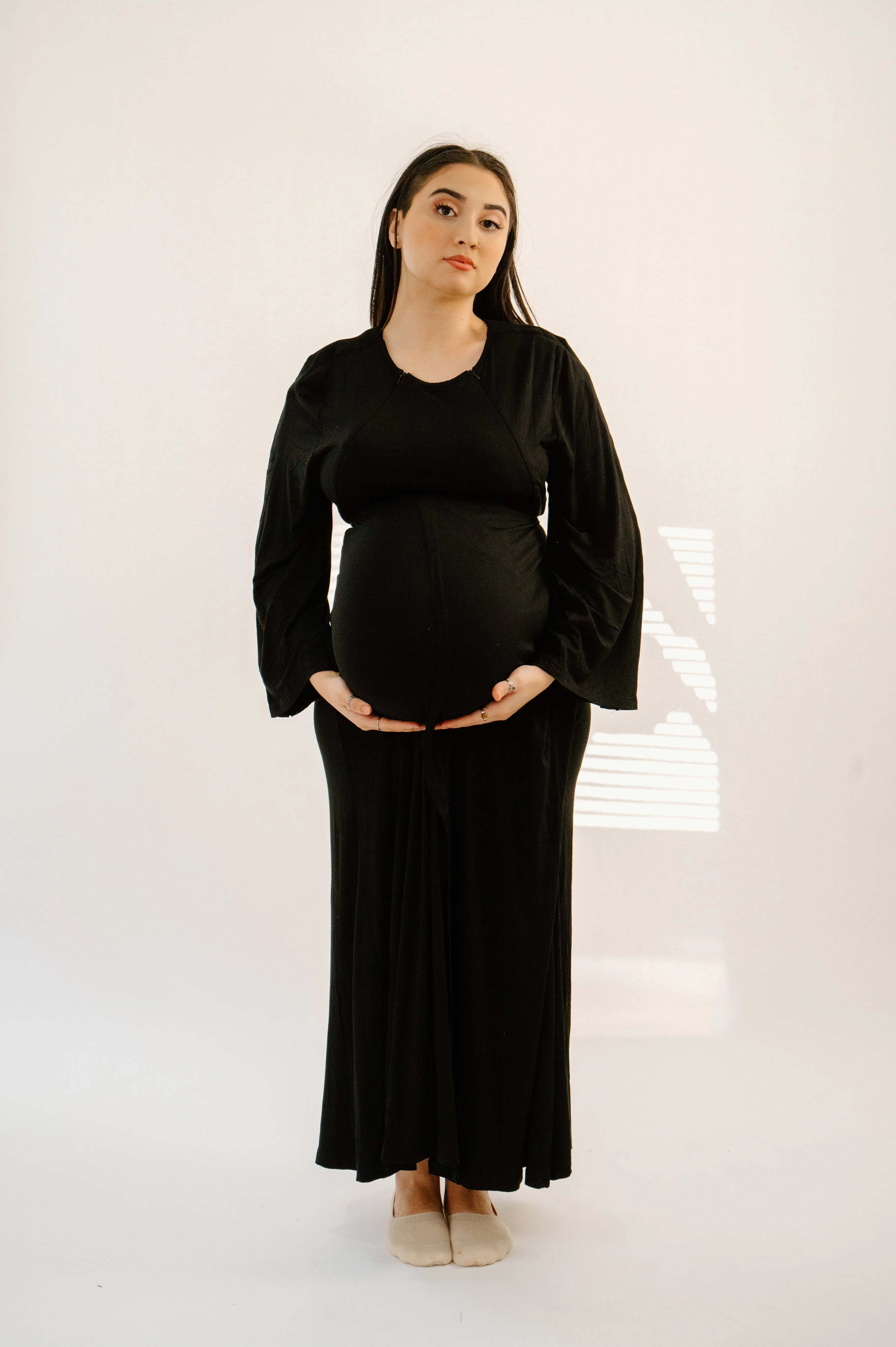 Nadia Labor & Postpartum Gown in Black sold by Lila Maternity