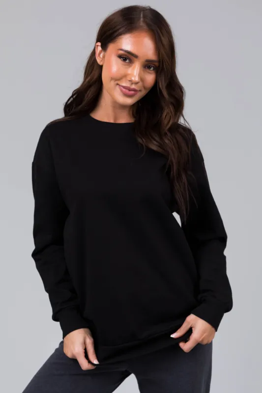 Black Fleece Lined Longline Solid Sweatshirt sold by Lime Lush