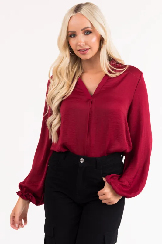 Maroon V Neck Long Sleeve Satin Top sold by Lime Lush