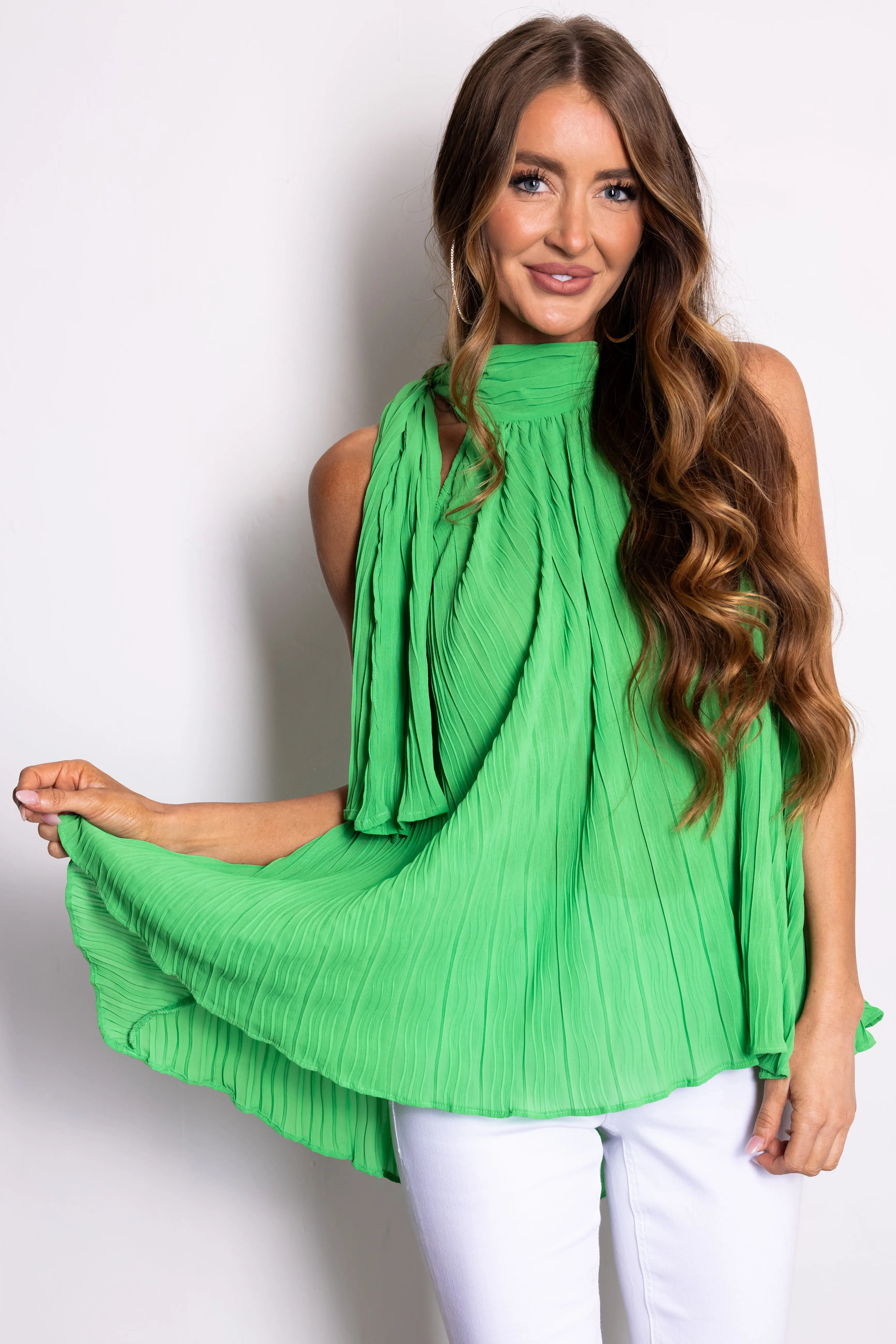 Kiwi Sleeveless Neck Tie Pleated Blouse sold by Lime Lush