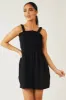 Black Smocked Elastic Strappy Back Woven Romper sold by Lime Lush