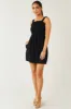 Black Smocked Elastic Strappy Back Woven Romper sold by Lime Lush