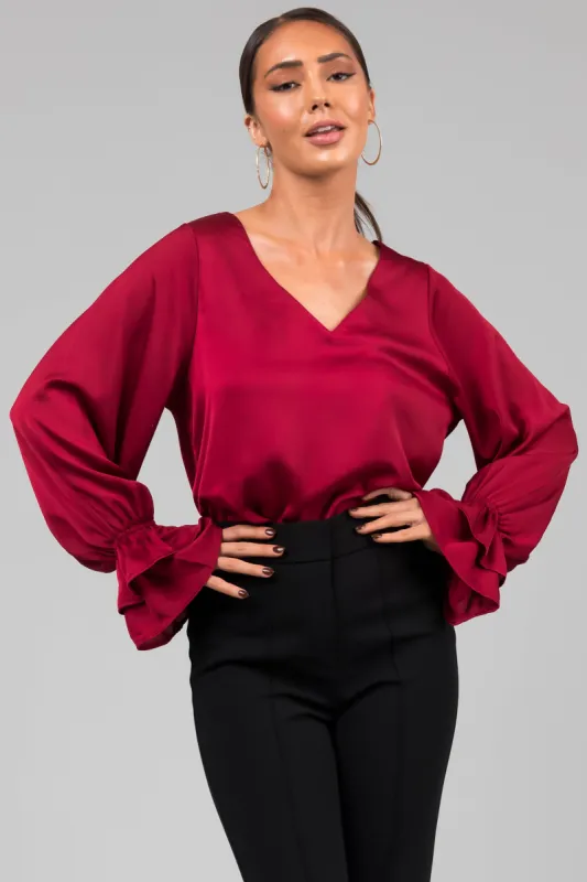 Burgundy V Neck Ruffle Cuff Satin Blouse sold by Lime Lush