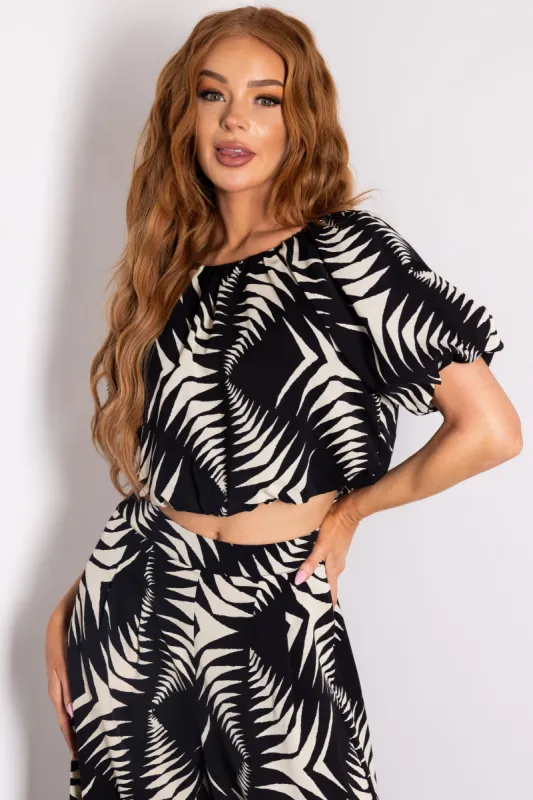 Black and Cream Puff Sleeve Crop Top sold by Lime Lush