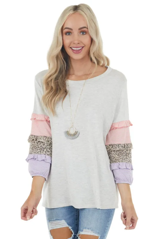 Heathered Dove Grey Knit Top with Multi Pattern Sleeves sold by Lime Lush