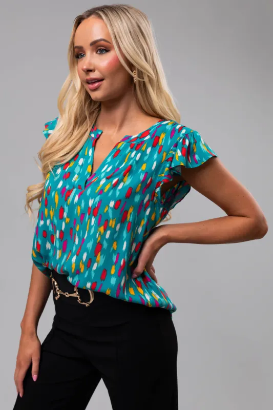 Teal Brush Stroke Notch Neck Ruffle Sleeve Top sold by Lime Lush