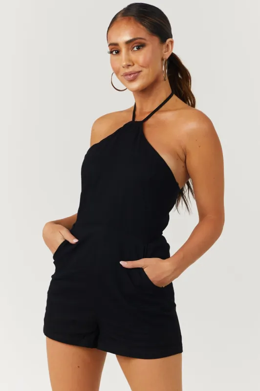 Black Halter Back Tie Smocked Back Romper sold by Lime Lush