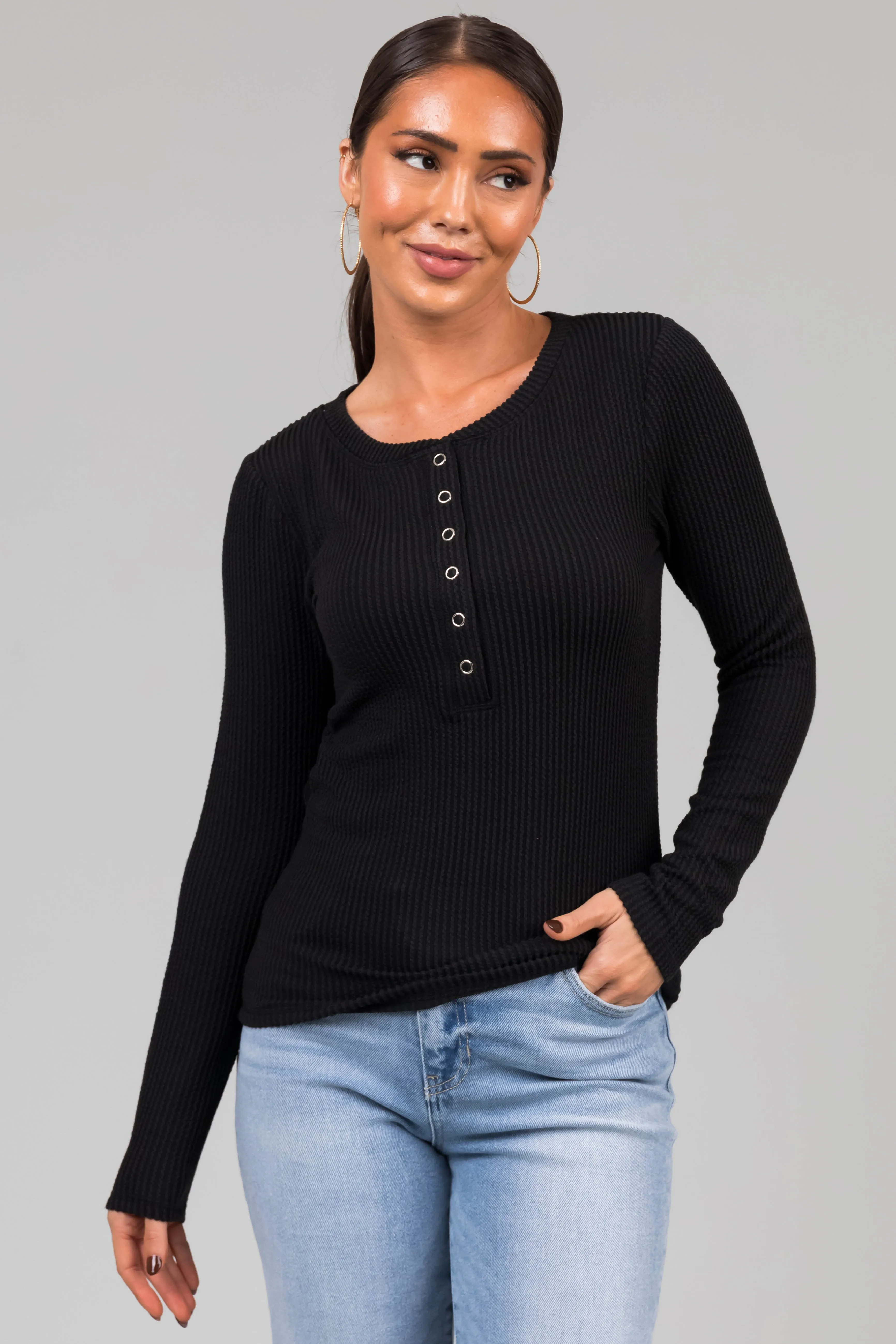 Black Wavy Ribbed Knit Snap Button Top sold by Lime Lush