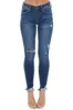 Special A Medium Wash Mid Rise Skinny Jean with Distressing sold by Lime Lush