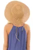 Tan Straw Floppy Hat with Bow Tie sold by Lime Lush
