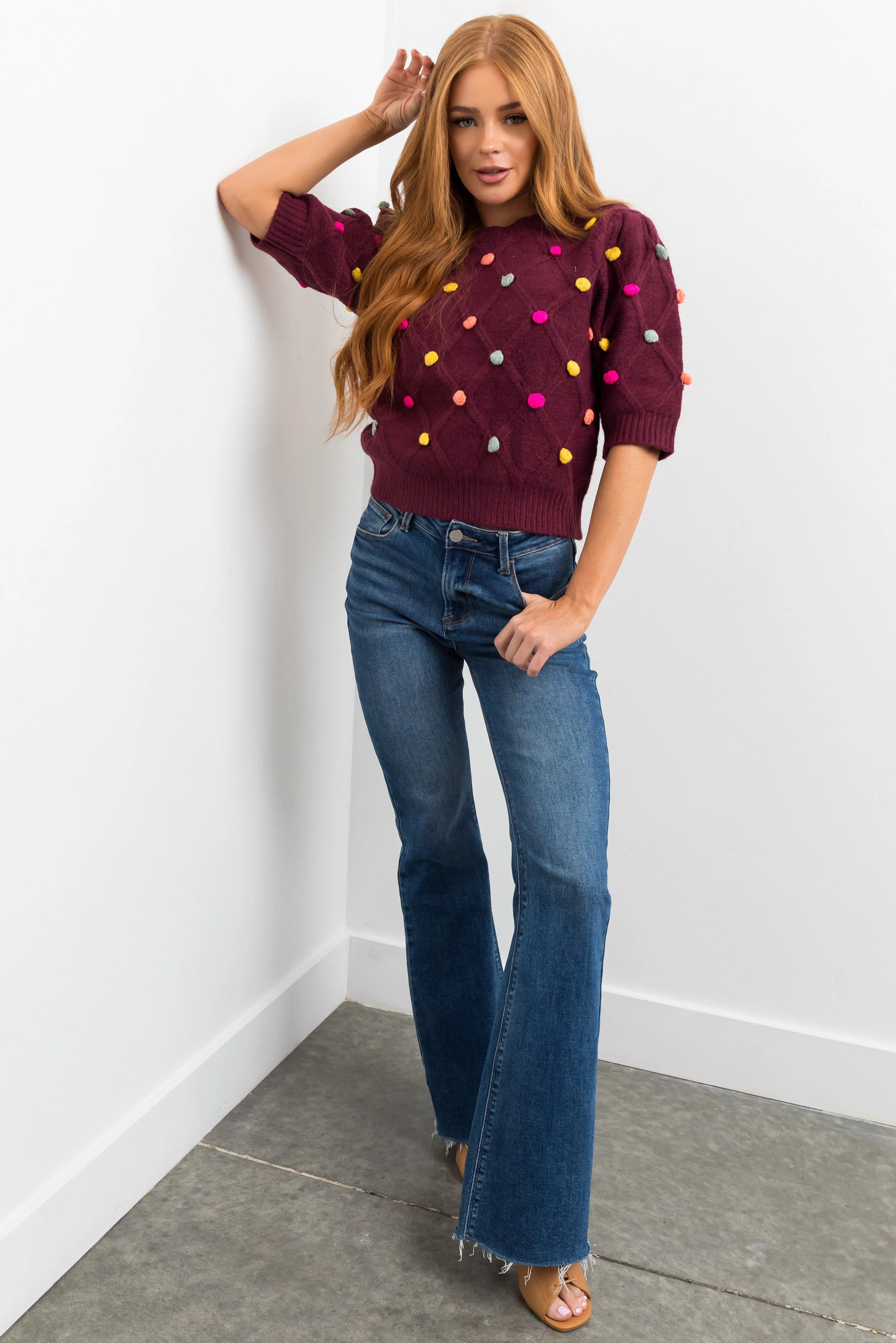 Risen Medium High Rise Raw Hem Bootcut Jeans sold by Lime Lush