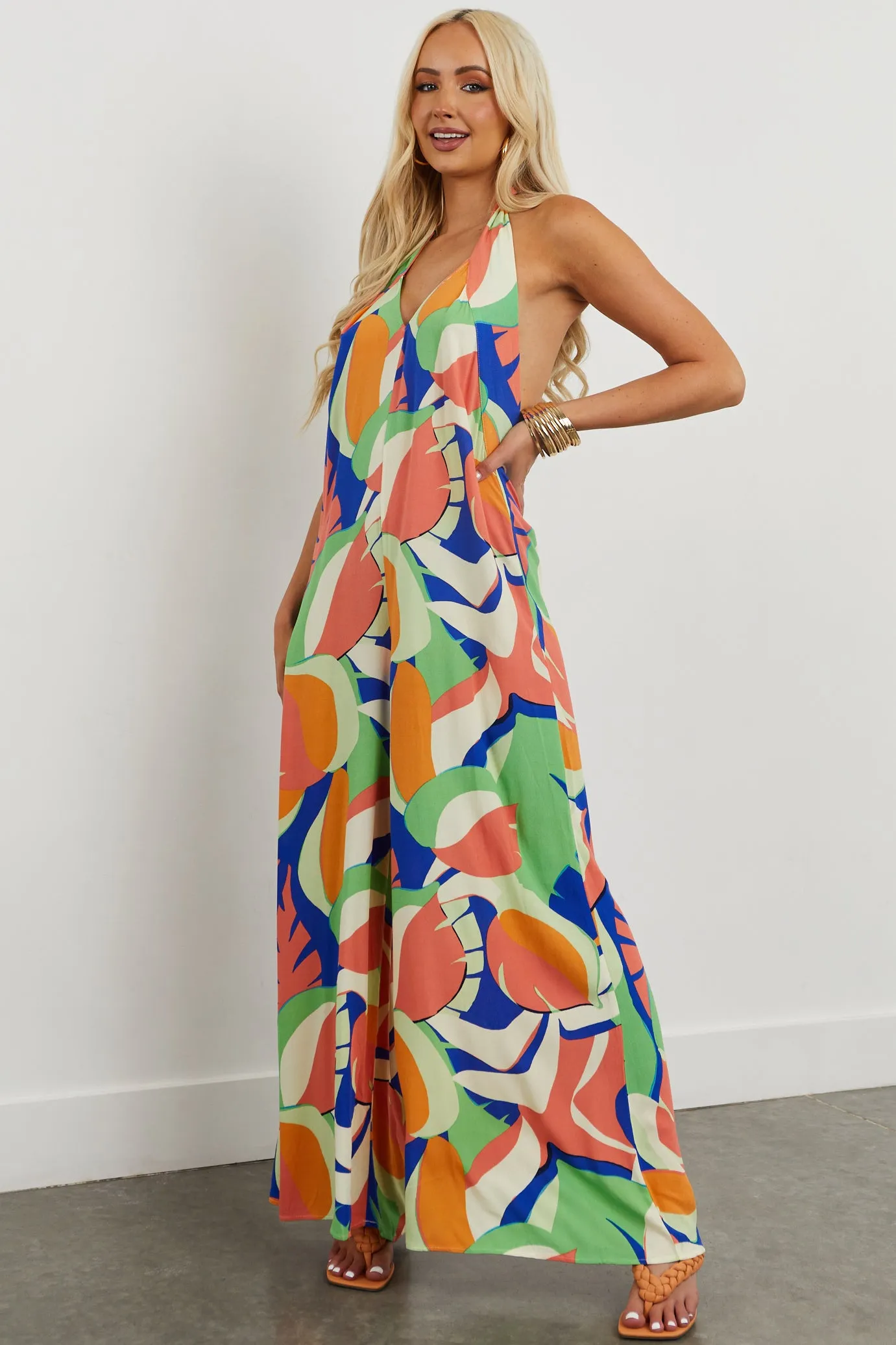 Salmon Tropical Print Halter Wide Leg Jumpsuit sold by Lime Lush