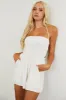 Off White Smocked Halter Neck Open Back Linen Romper sold by Lime Lush