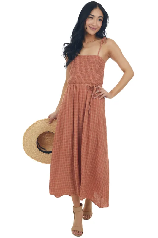 Cognac Gingham Smocked Tie Strap Midi Dress sold by Lime Lush