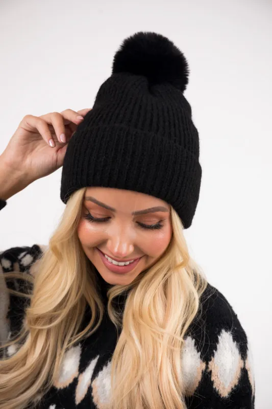 Black Faux Fur Pom Pom Ribbed Knit Beanie sold by Lime Lush