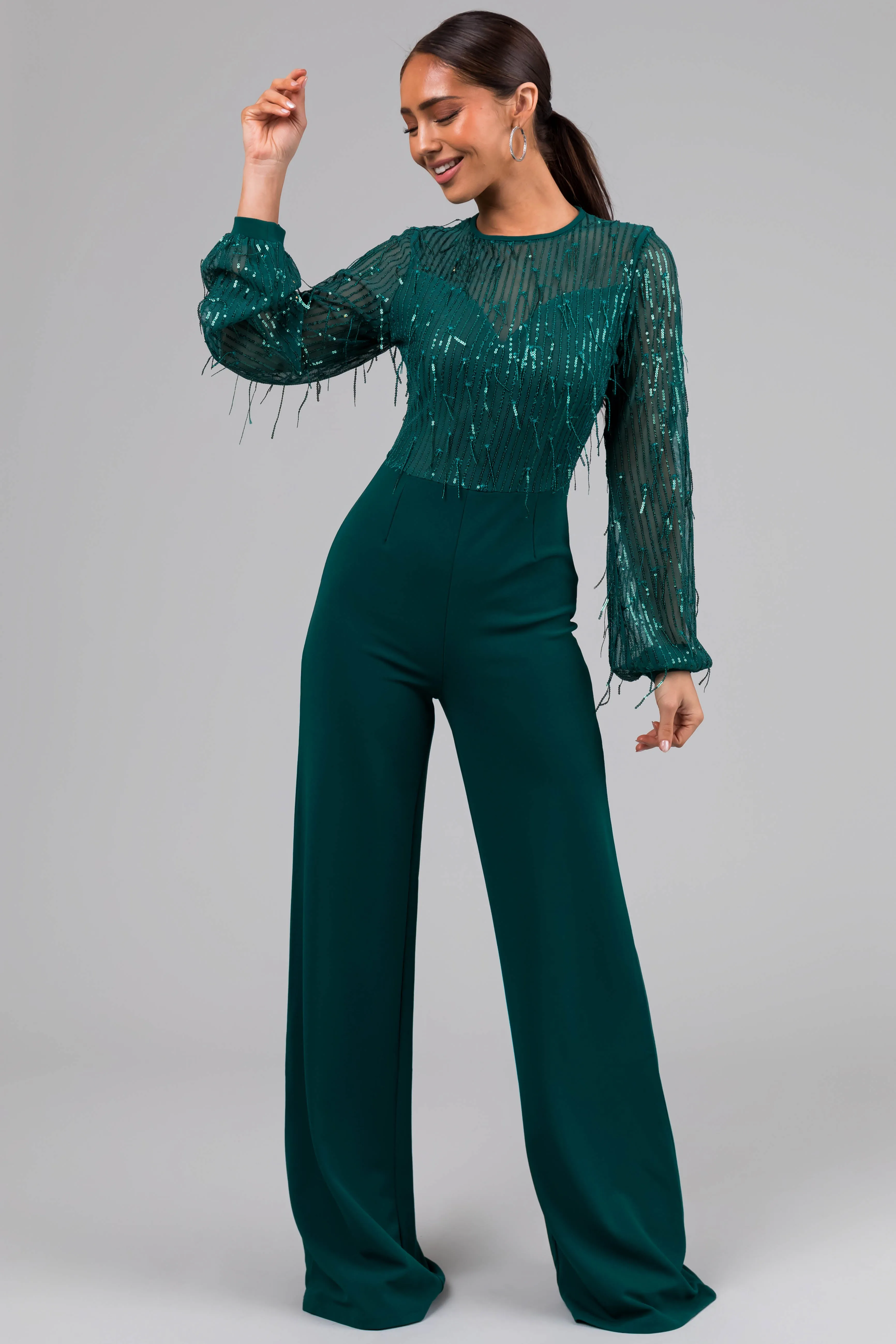Jade Sequin Fringe Long Sleeve Flare Jumpsuit sold by Lime Lush product image thumbnail 2