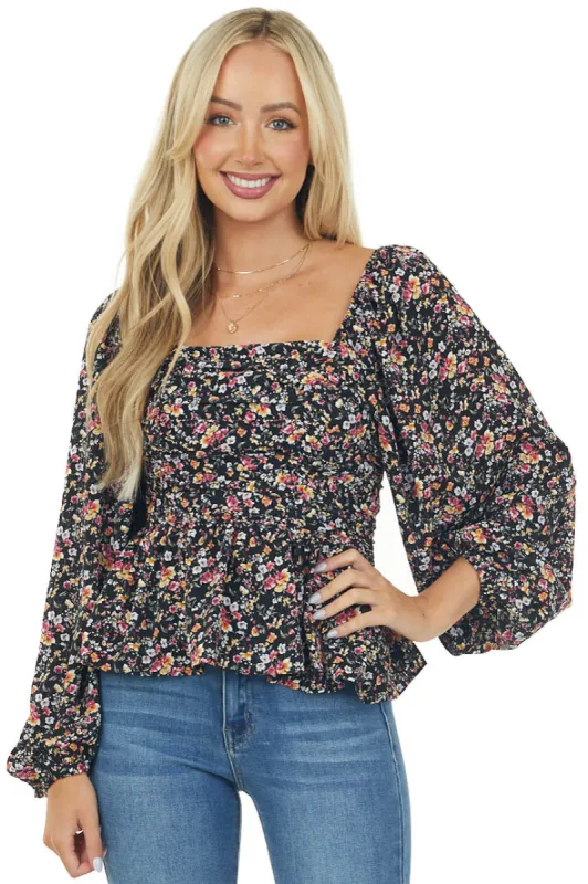 Black Floral Print Bubble Sleeve Peplum Blouse sold by Lime Lush