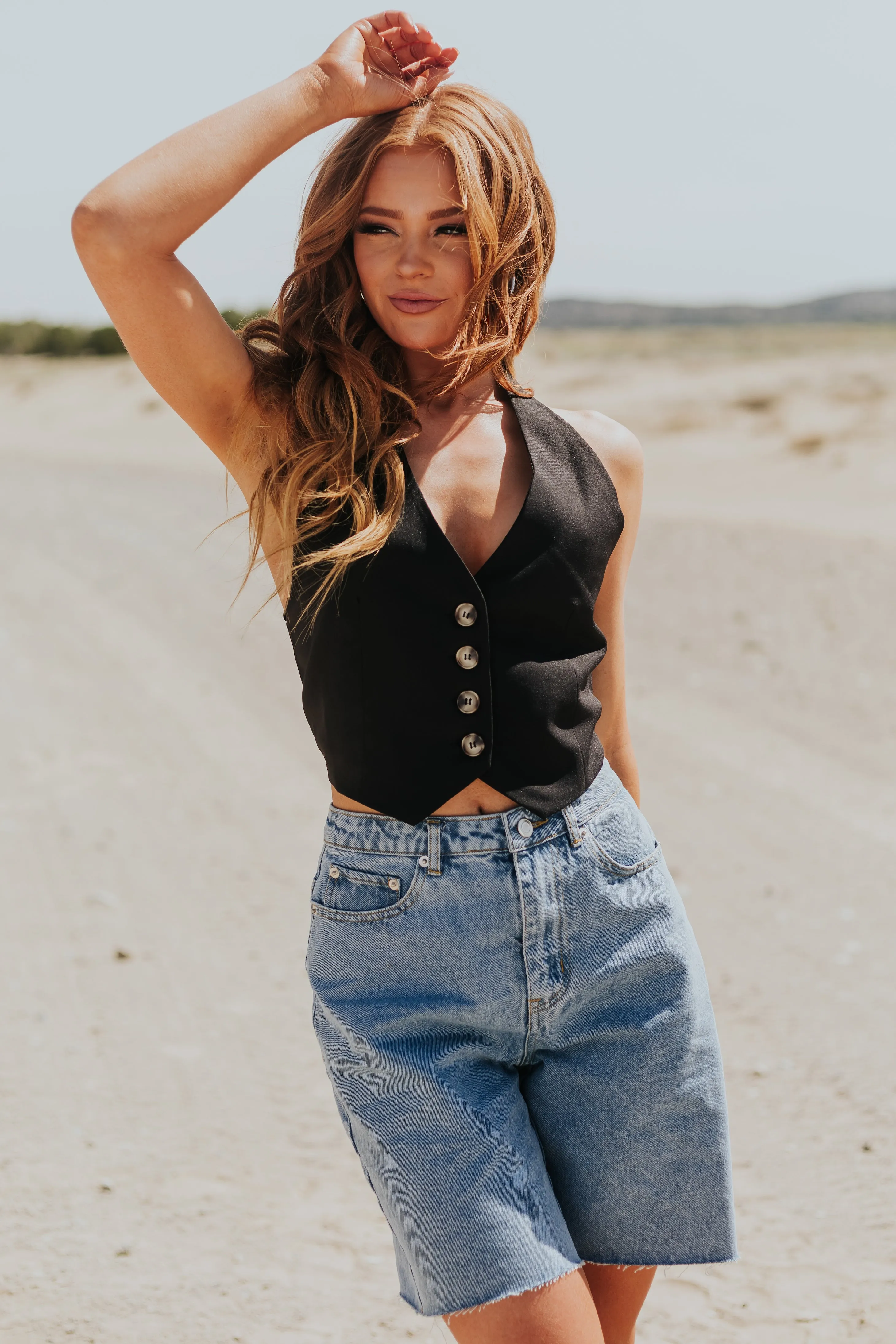 Black Sleeveless Halter Neck Button Up Vest sold by Lime Lush