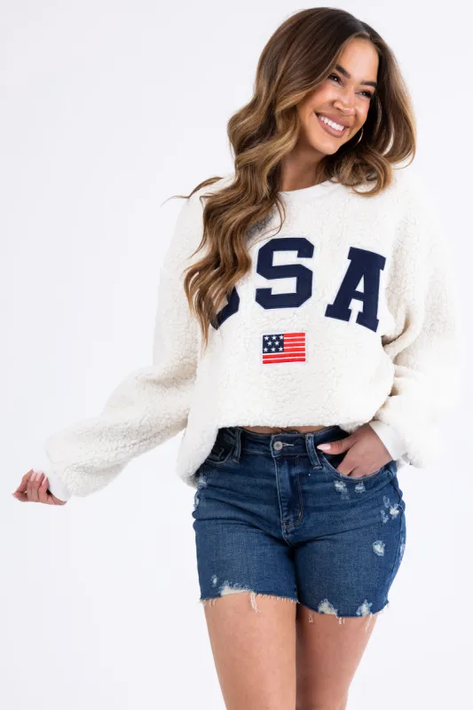 Cream Sherpa 'USA' Embroidered Pullover sold by Lime Lush