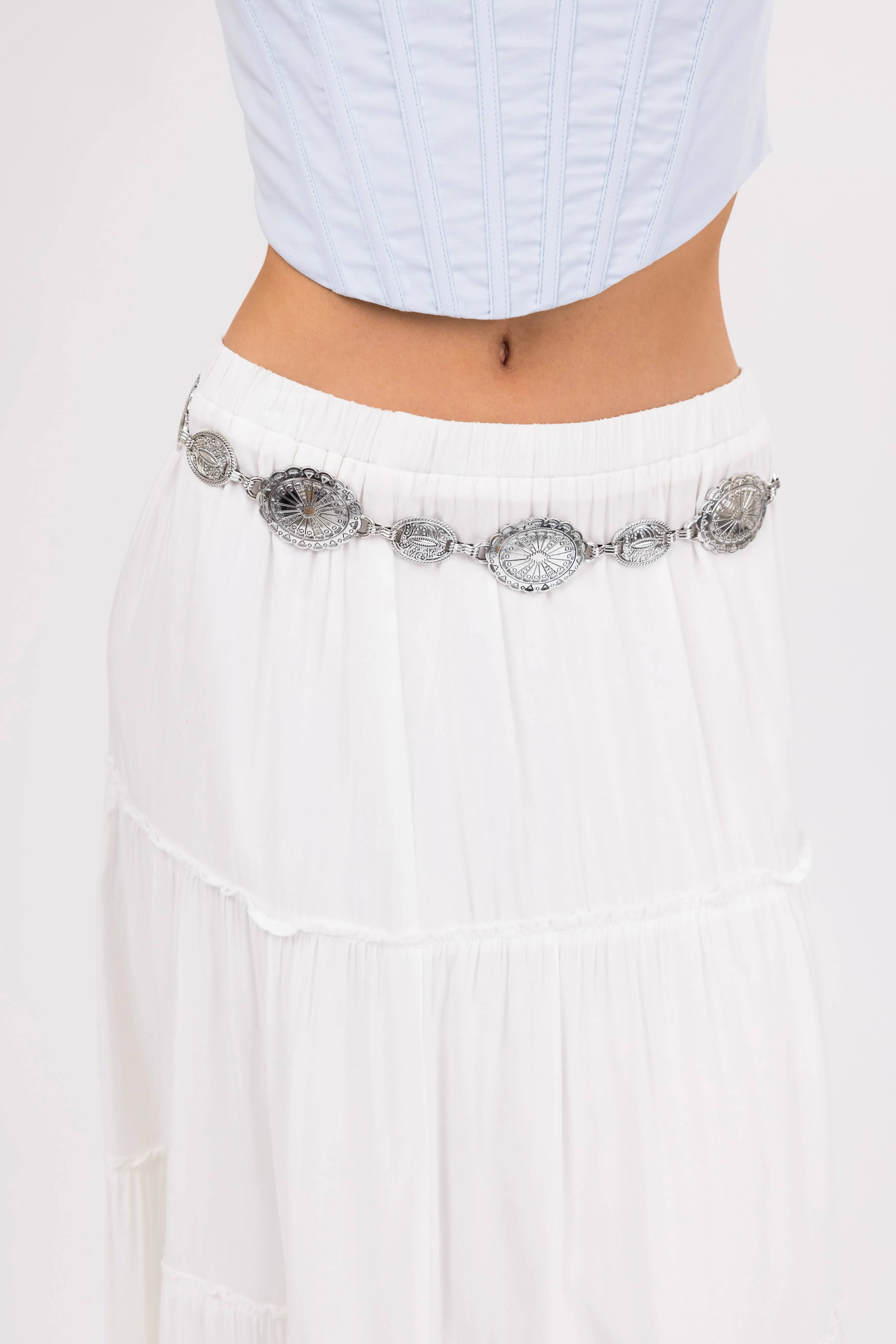 Silver Engraved Western Disc Metallic Belt sold by Lime Lush