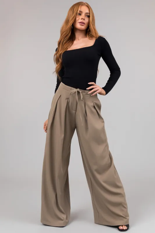 Olive Front Tie Pleated Wide Leg Pants sold by Lime Lush