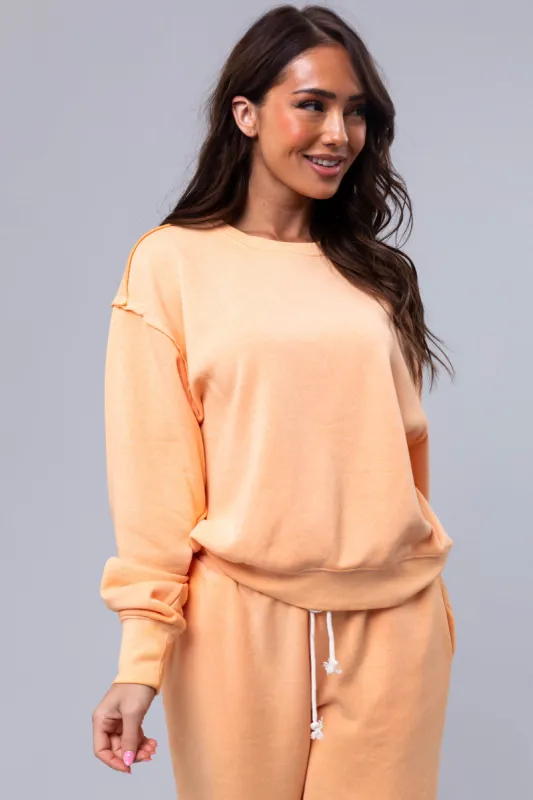 Bright Melon Washed Long Sleeve Knit Sweatshirt sold by Lime Lush