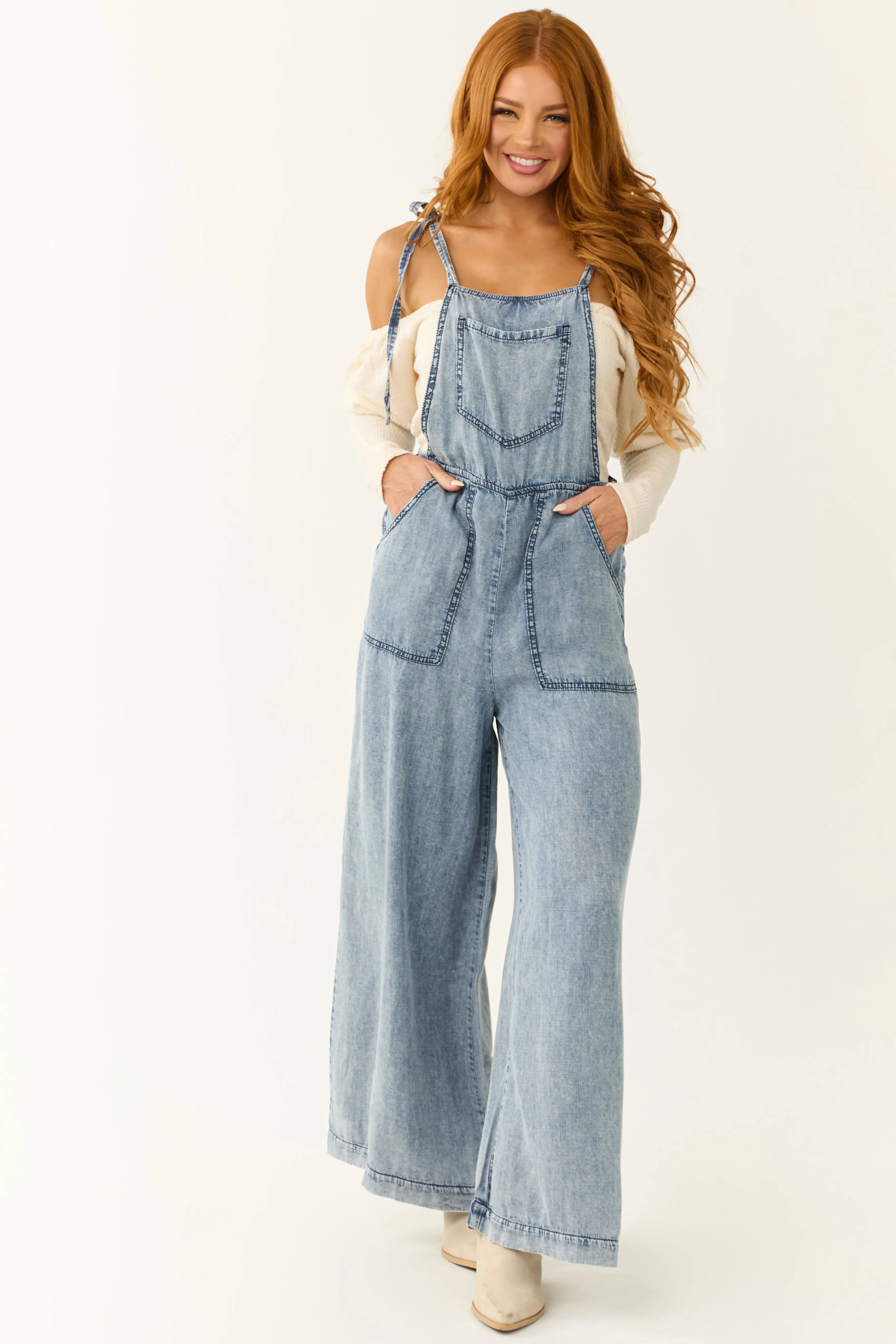 Medium Acid Wash Denim Wide Leg Jumpsuit sold by Lime Lush