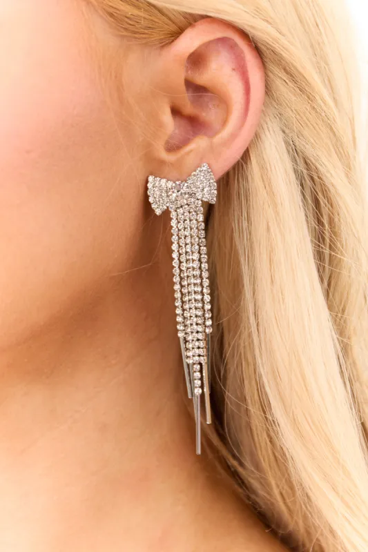 Silver Rhinestone Bow Detail Drop Earrings sold by Lime Lush
