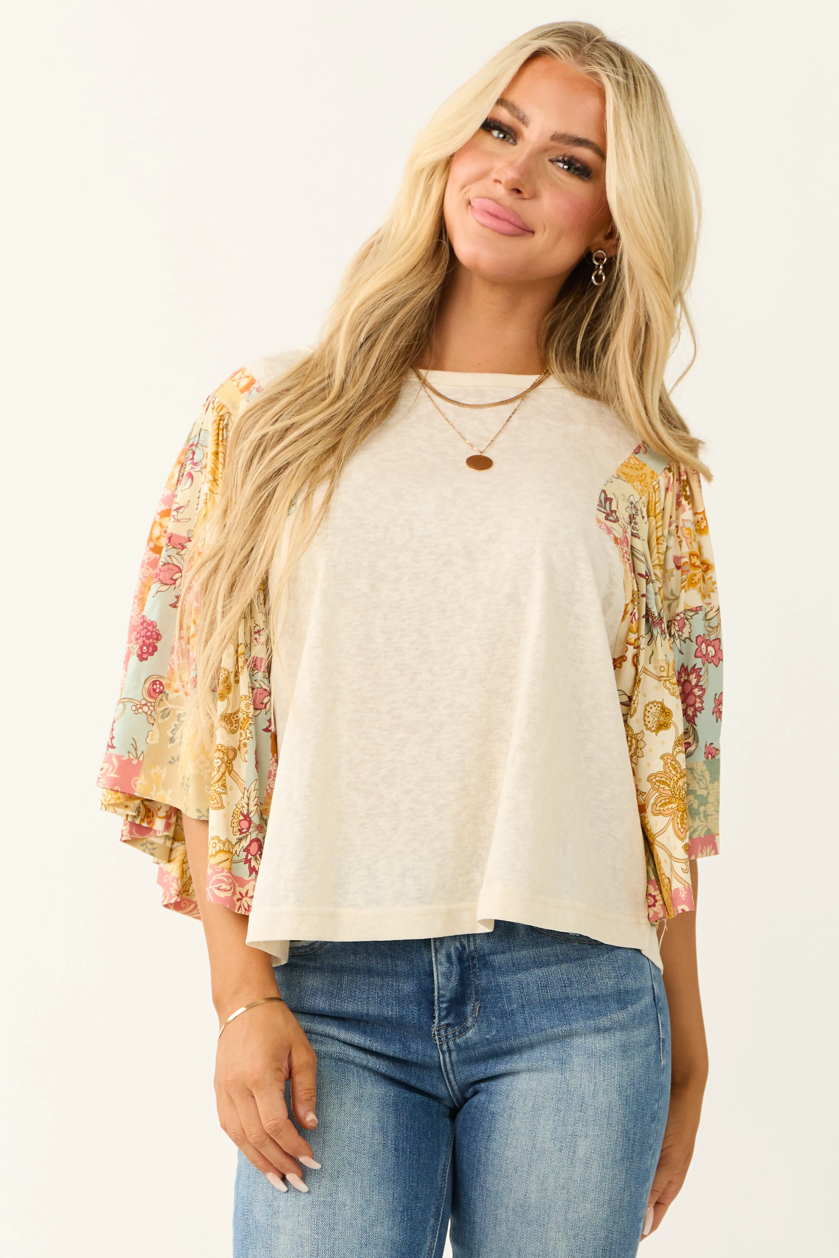 Cream Floral Print Oversized Flutter Sleeve Top sold by Lime Lush