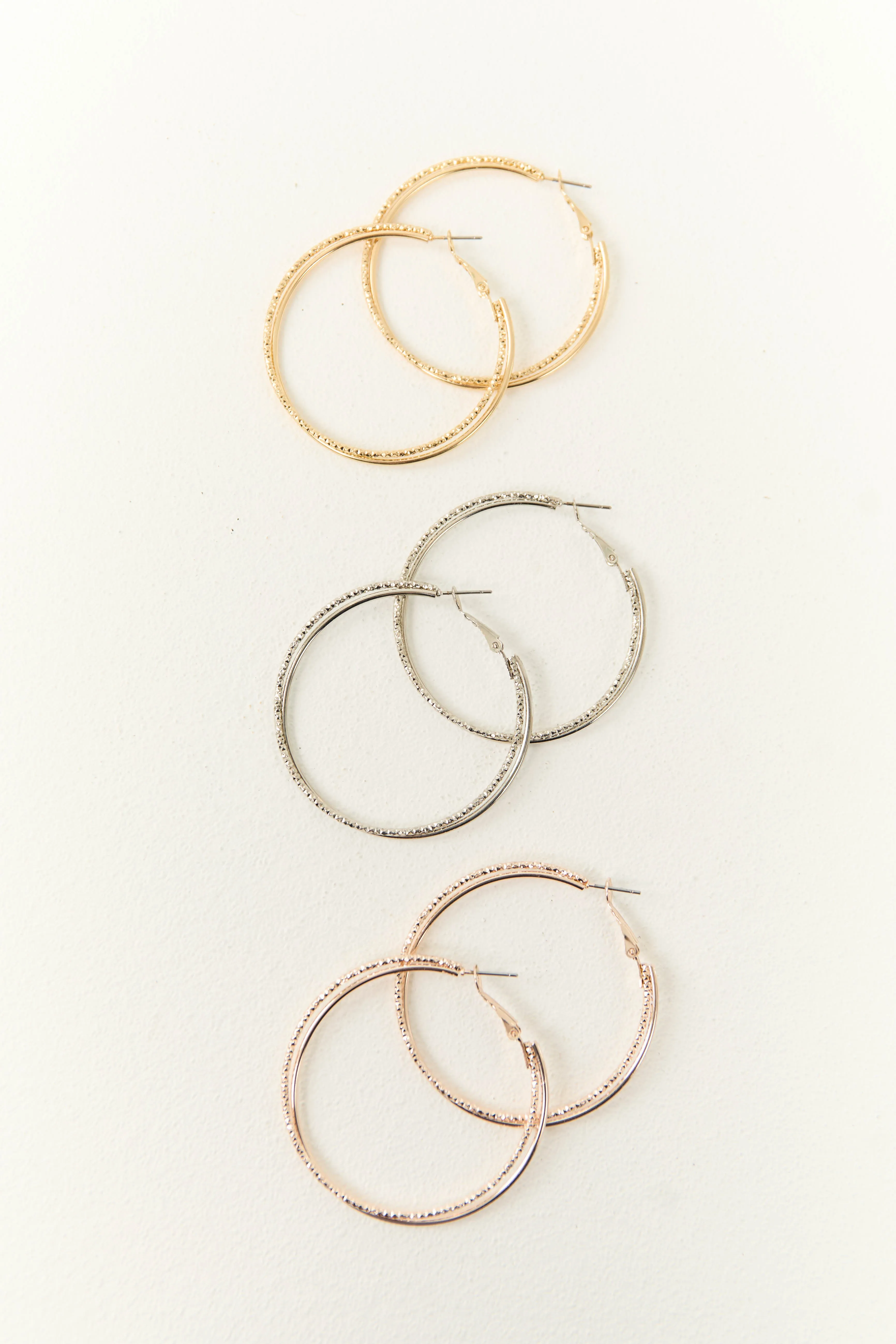 Multicolor Metallic Double Hoop Earring Set sold by Lime Lush