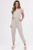 Oatmeal Ruffle Short Sleeve Soft Knit Jumpsuit sold by Lime Lush