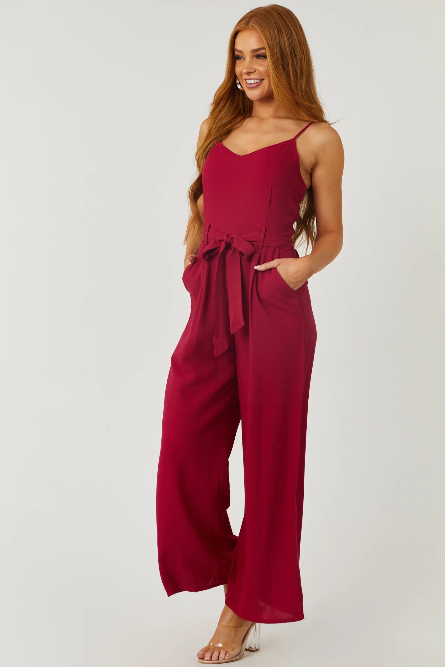 Wine Sleeveless Smocked Jumpsuit with Waist Tie sold by Lime Lush