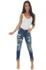 KanCan Midwash Skinny Jeans with Leopard Cuffed Hem and Patches sold by Lime Lush