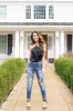 KanCan Midwash Skinny Jeans with Leopard Cuffed Hem and Patches sold by Lime Lush
